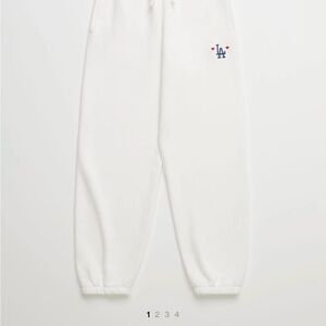 Madhappy White Joggers with Blue and Red Logo